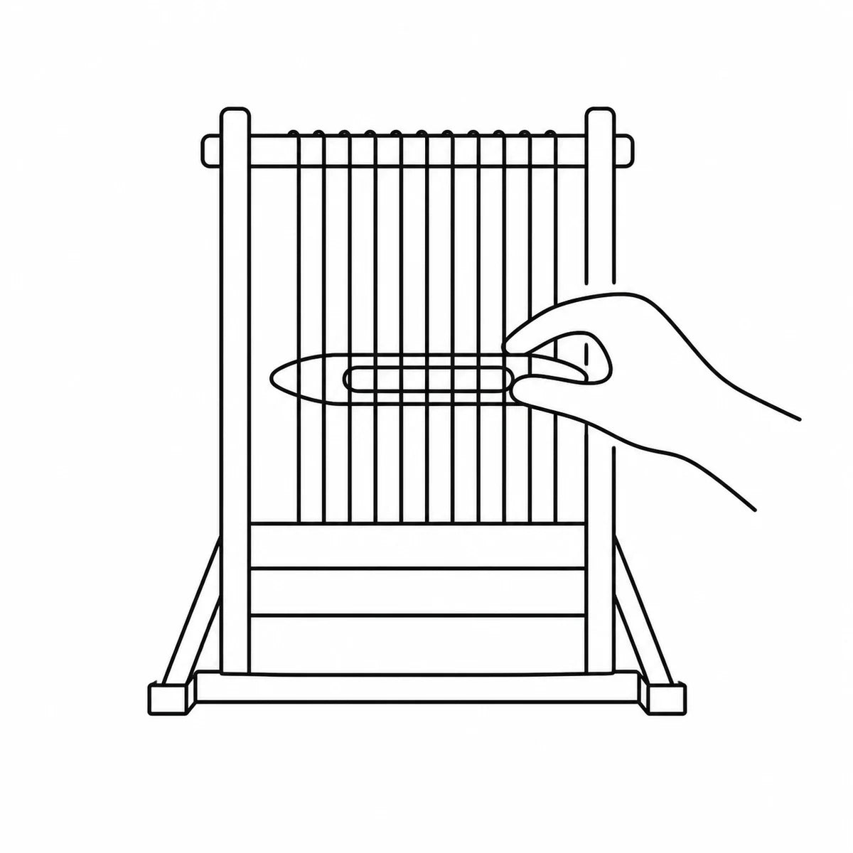 A hand weaving at a loom