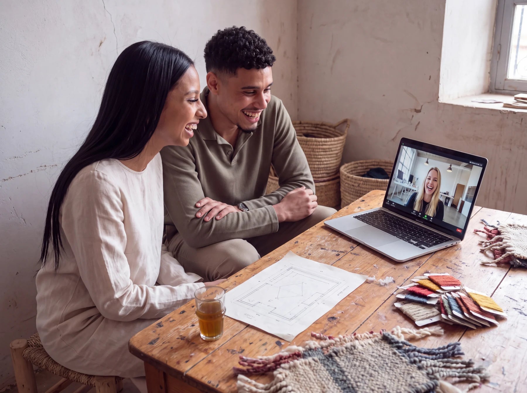 Vorug's sibling founders discuss a measured room with an American interior designer by video call